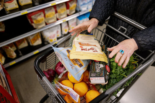 woman shopping at Sainsburys